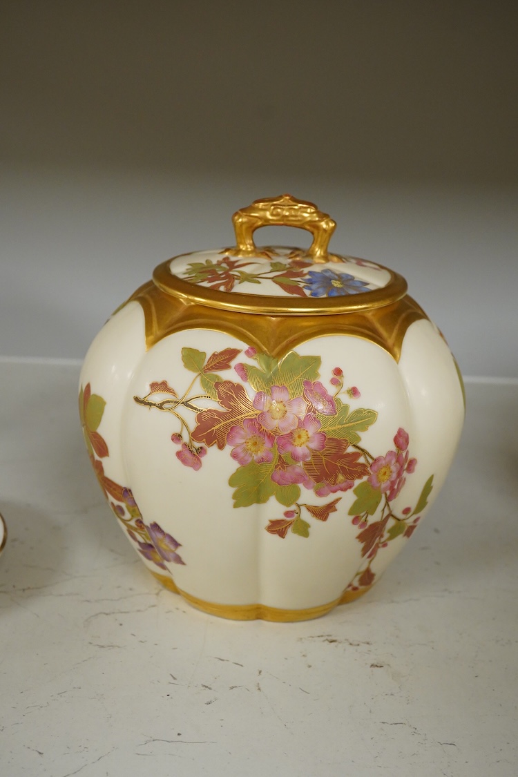 Three 19th century Worcester blush ivory potpourri or biscuit jars and covers, two with liners, each decorated with flowers and buds, largest 20cm high